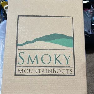 Smoky cowboy boots. Size 4 and 1/2.Never worn.